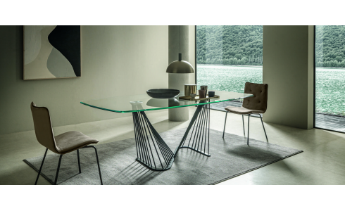 Az Arpa asztal különleges vonalvezetésű és egyedi formatervezésű, amely modern és stílusos légkört teremt az étkezőben. A letisztult megjelenésű asztallap és az elegáns lábak kombinációja lenyűgöző látványt nyújt.
