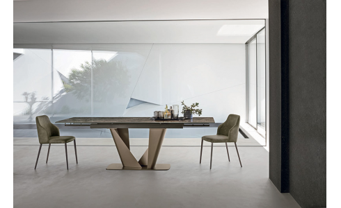Silver modern étkezőasztal fém lába különleges, csavart formájú, ami többféle színben rendelhető. Az asztal 22 féle méretben választható fix, vagy nyitható illetve téglalap vagy hordó alakú lappal, melynek anyaga lehet laminált, fa, üveg vagy kerámialap.