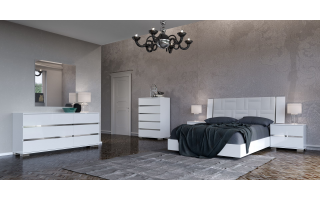 Status Dream 1 hálószobabútor magasfényű fehér színben rendelhető, az ágy fejvége rombusz vagy geometrikus alakú steppeléssel készített műbőrrel választható.